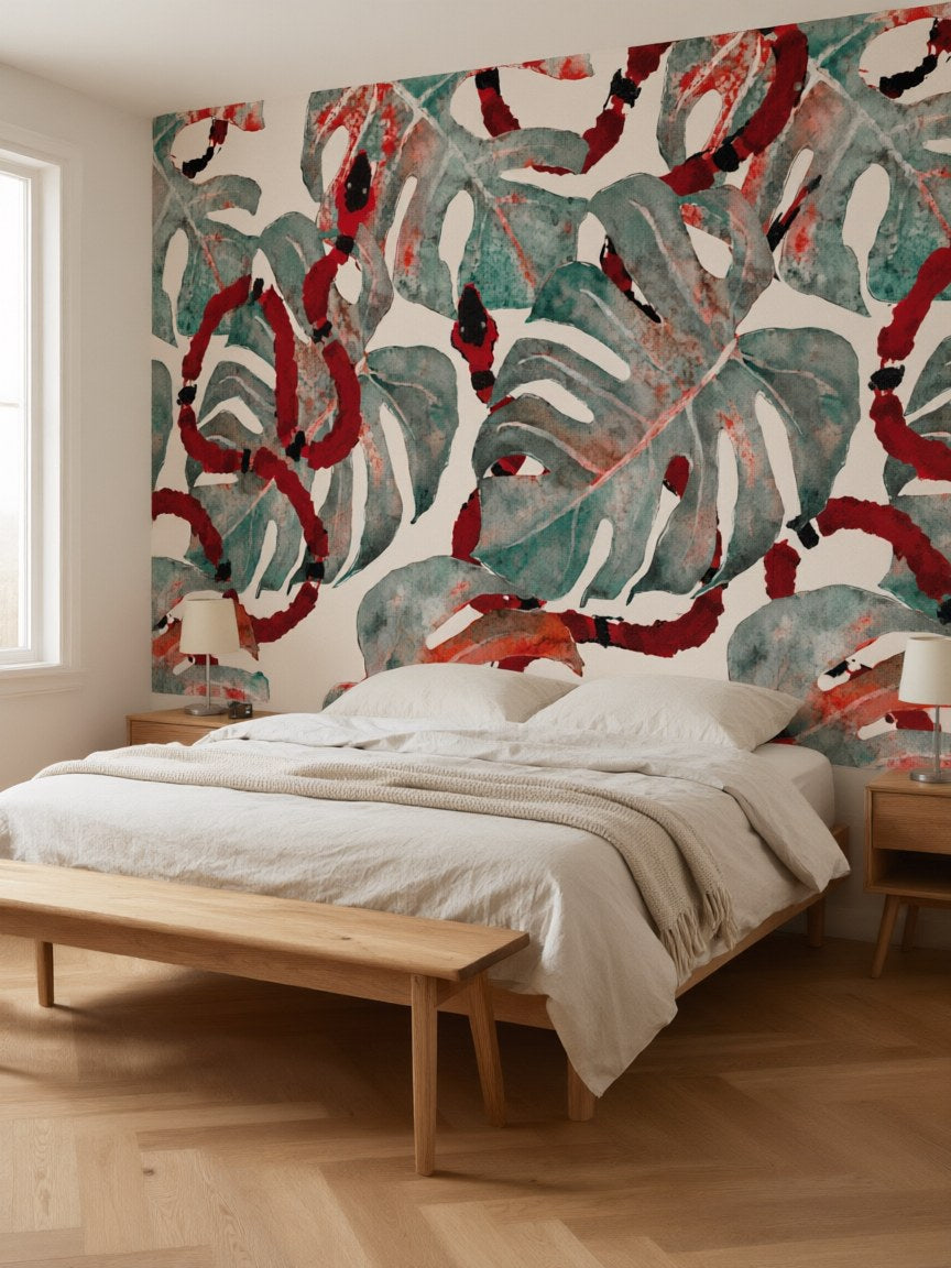 Papier peint panoramique Monstera et serpents posé dans une chambre