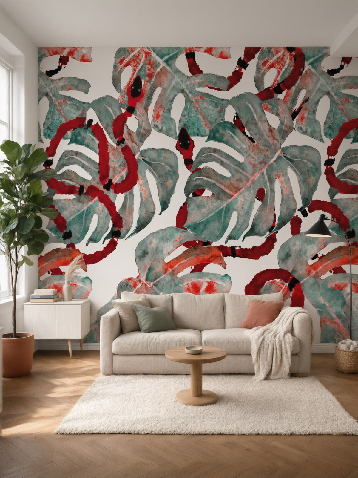 Papier peint panoramique Monstera et serpents posé dans un salon